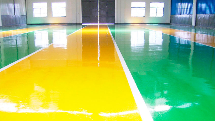 Señalización de pavimentos industriales con pintura Epoxi